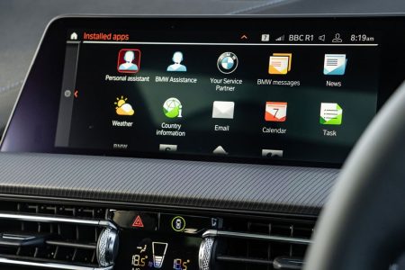 BMW interior protection film applied to dashboard for enhanced durability and style.