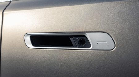 Close-up of BMW door handle with protective film for all models.