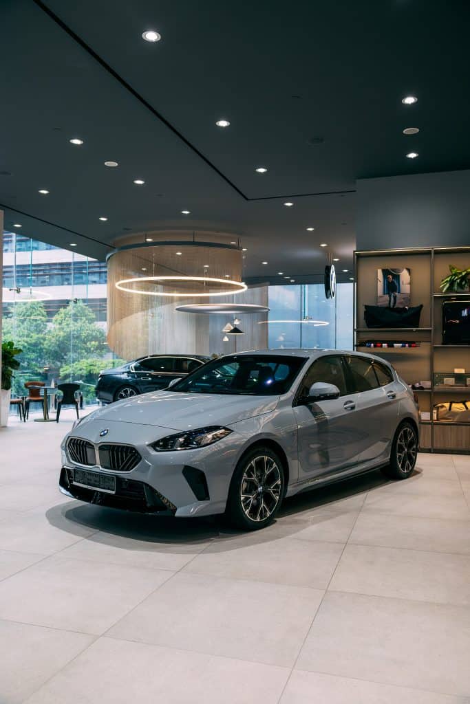 BMW car with protective film in showroom.